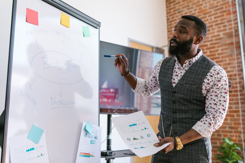 man at whiteboard