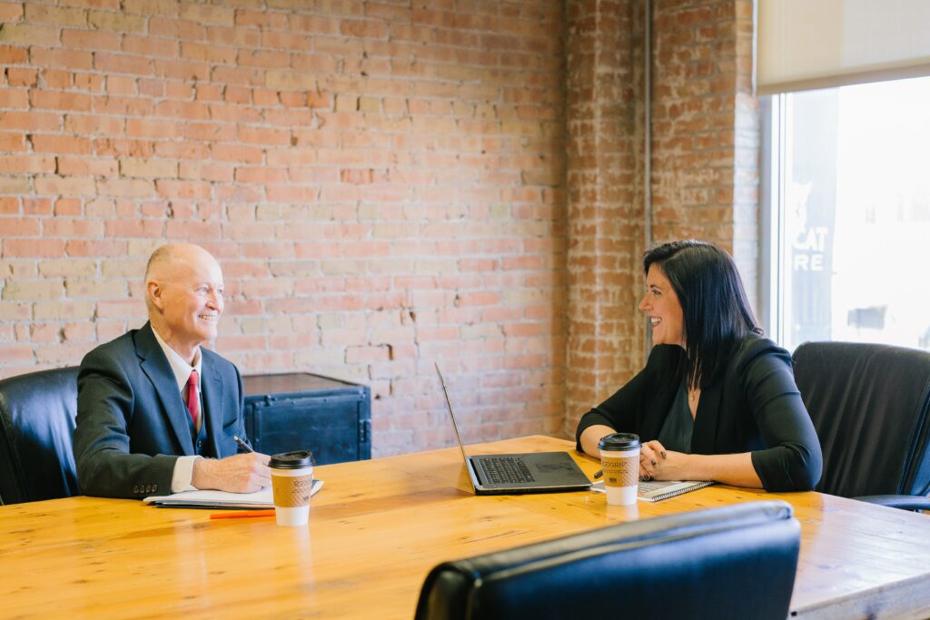 man and woman work meeting