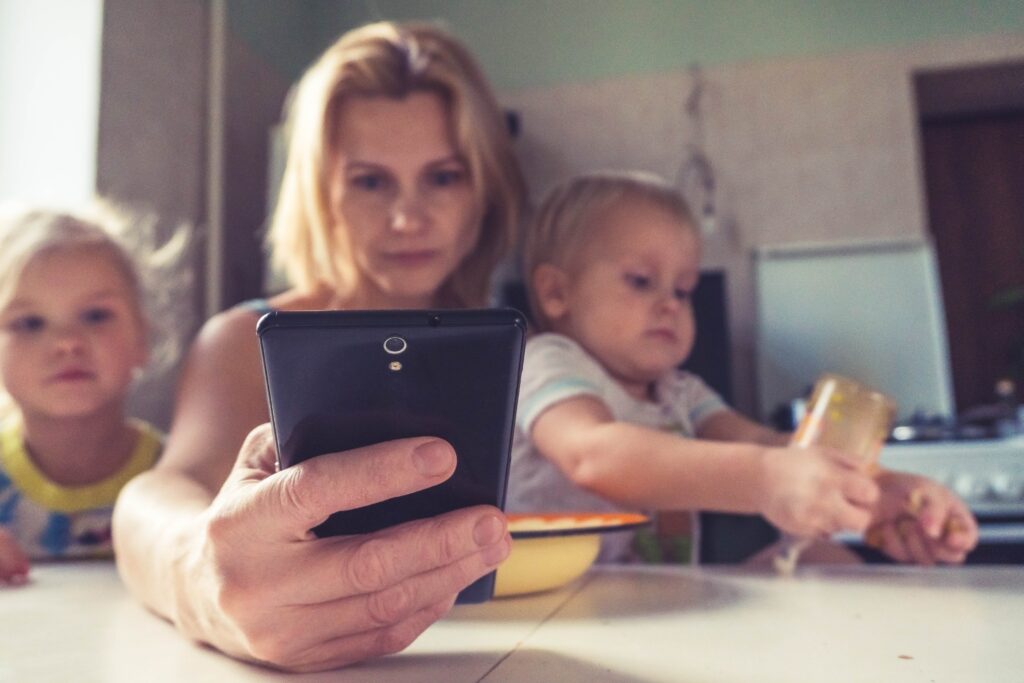 busy mom on phone