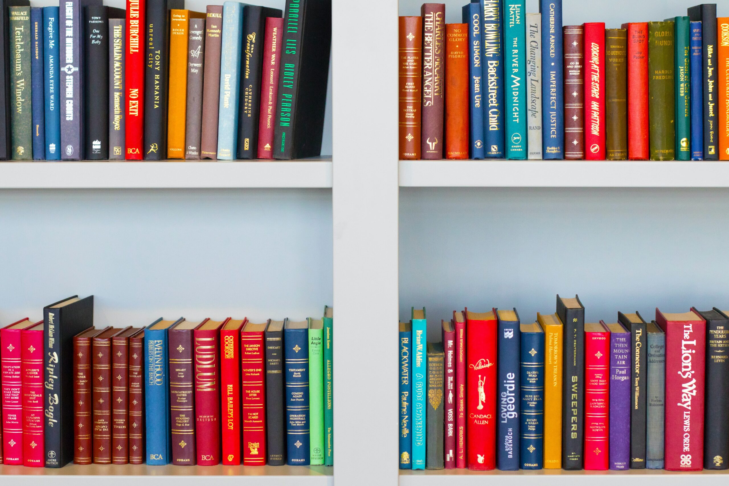 colorful novels on bookshelf